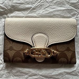 Coach jade medium envelope wallet in signature canvas